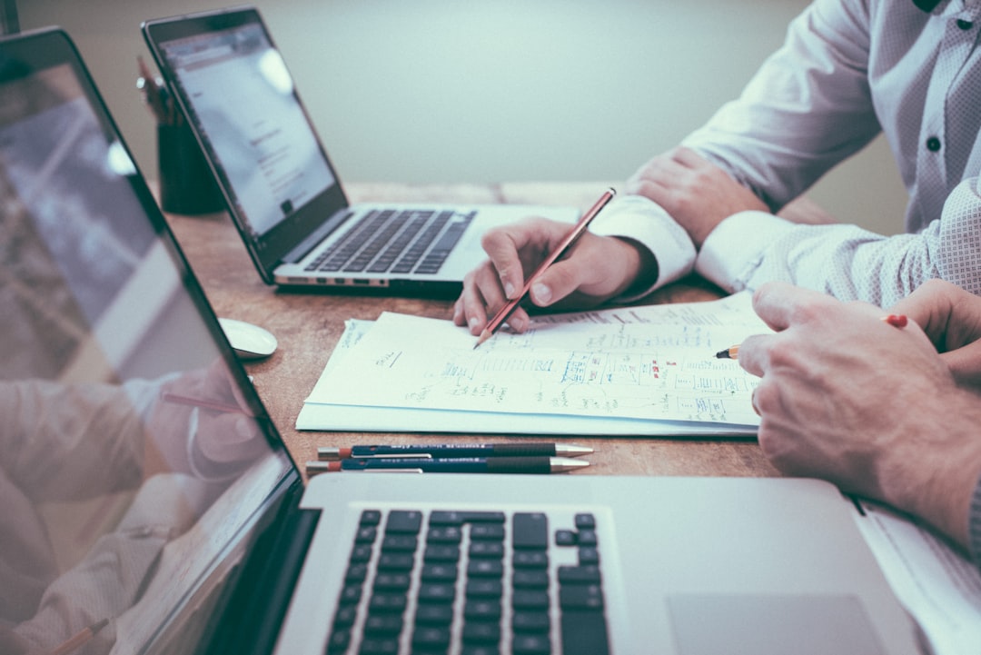 Small business team reviewing website and marketing plans in a Greenville office (Photo by Scott Graham on Unsplash)